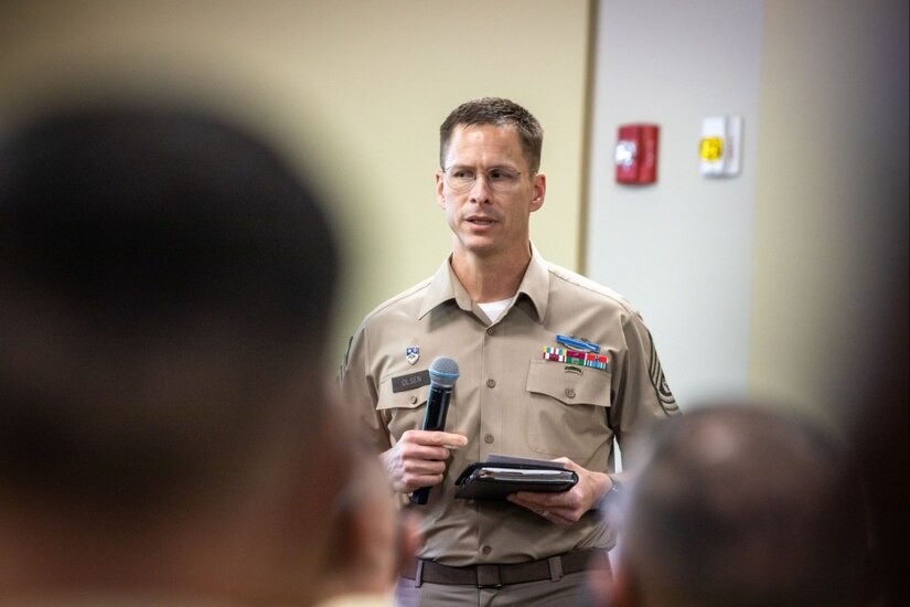 U.S. Command Sgt. Maj. Eric Olsen, the U.S. Army South senior enlisted leader, participates in a discussion during an organizational leadership panel in the Western Hemisphere Institute for Security Cooperation auditorium at Fort Benning, Ga., during the Programa Integral para Suboficiales de Alta Jerarquía (PISAJ-20), May 5, 2025. PISAJ is a geo-strategic semiannual military engagement focused on developing, advancing, and professionalizing the Colombian army senior NCO corps. (U.S. Army photo by Sgt. First Class ShaTyra Cox) (Photo Credit: Sgt. 1st Class ShaTyra Reed-Cox)