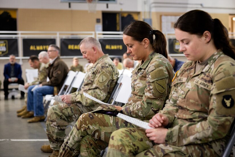 Service members pray during the service at the Kentucky National Day of Prayer event at the Wellman Armory in Frankfort, Ky. on May 1, 2025. The Kentucky National Guard held its 15th annual National Day of Prayer for service members, civilians, fallen warriors and their families at a breakfast ceremony. (U.S. Army National Guard photo by Andy Dickson)
