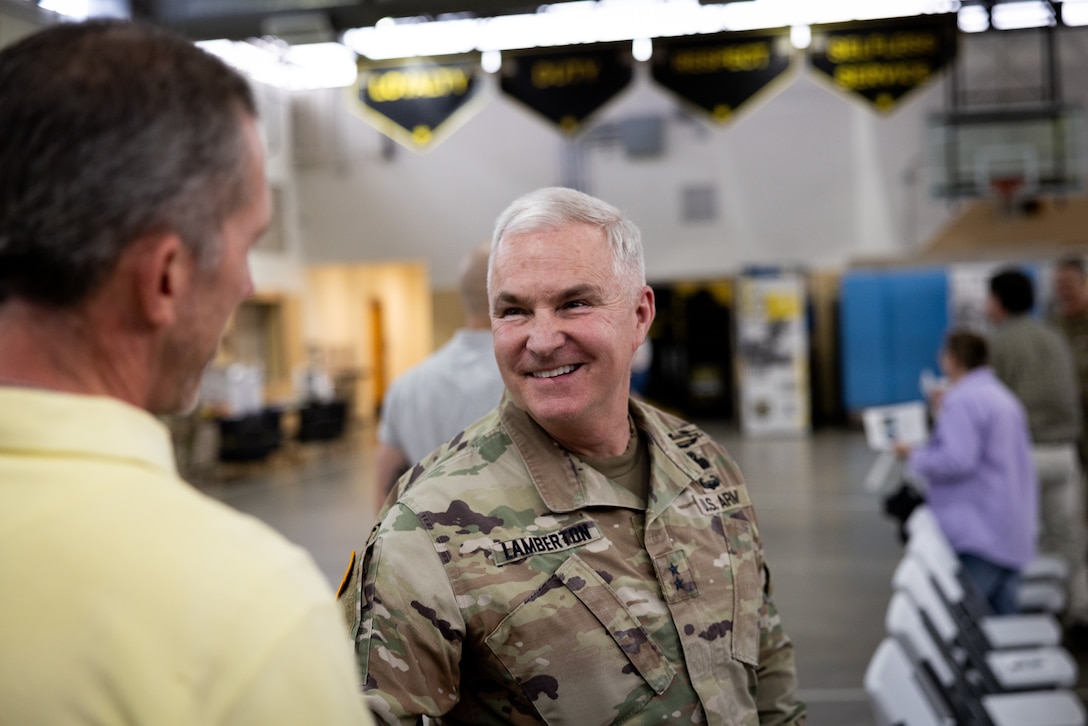 U.S. Army Maj. Gen. Haldane Lamberton, Kentucky’s adjutant general, smiles as he talks with Chap. (Lt. Col.) Joshua Stine at the Kentucky National Day of Prayer event at the Wellman Armory in Frankfort, Ky. on May 1, 2025. The Kentucky National Guard held its 15th annual National Day of Prayer for service members, civilians, fallen warriors and their families at a breakfast ceremony. (U.S. Army National Guard photo by Andy Dickson)