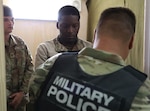 Competitors in the fourth annual Army interrogation competition, “Tranquil Storm,” conduct tactical interrogations in the Detainee Holding Area at Louisiana National Guard Training Center Pineville, April 30.