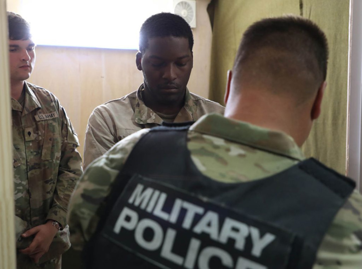 Competitors in the fourth annual Army interrogation competition, “Tranquil Storm,” conduct tactical interrogations in the Detainee Holding Area at Louisiana National Guard Training Center Pineville, April 30.