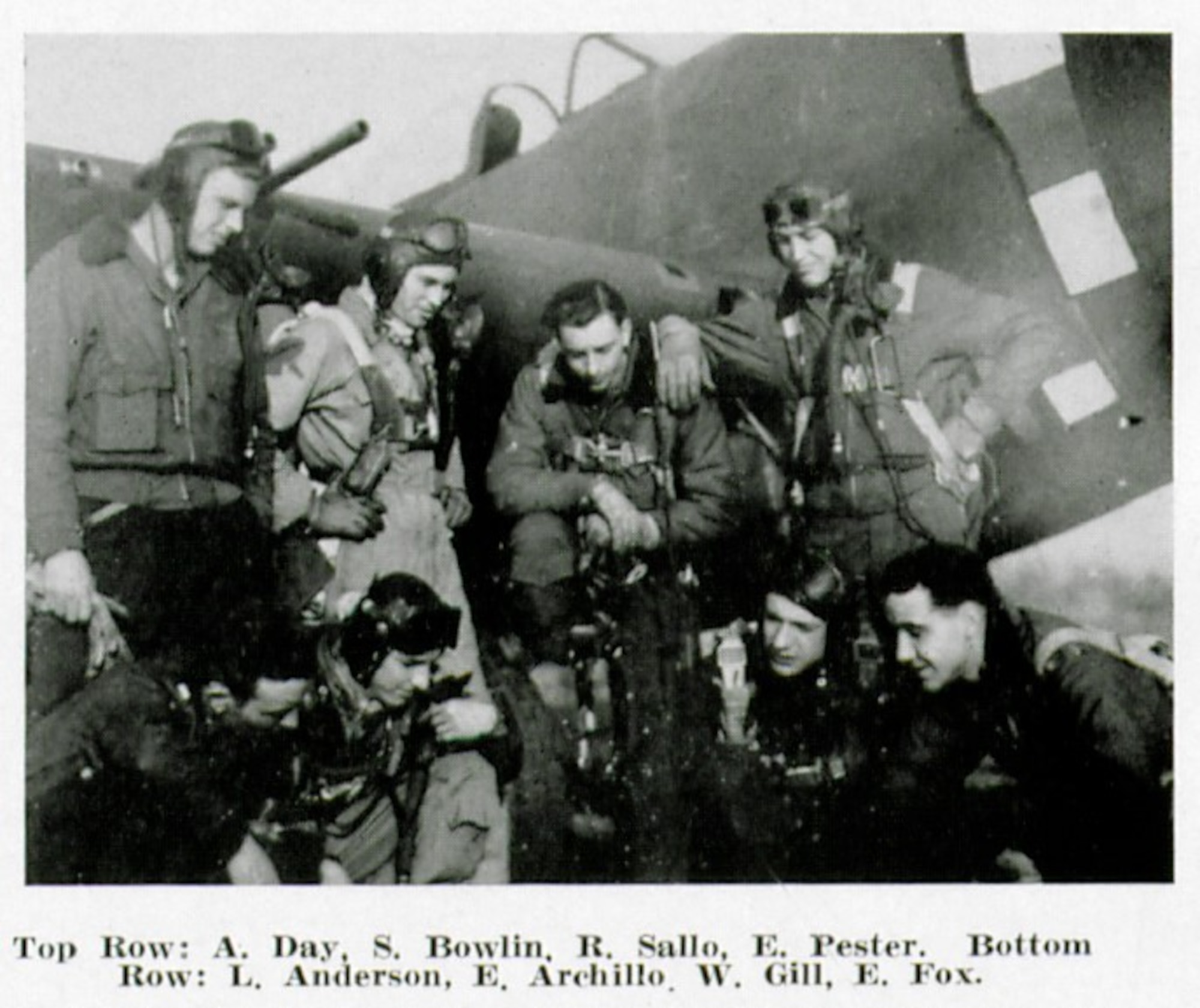 First Lieutenant William H. Gill, 405th Fighter Squadron, Distinguished Flying Cross recipient for a combat mission he flew on 17 March 1945, is shown in the bottom row, third from the left, of these pilots from the “Discharge Squadron.” One of the squadron’s P-47 Thunderbolt fighters serves as a backdrop.  (The Story of the 371st Fighter Group in the ETO)