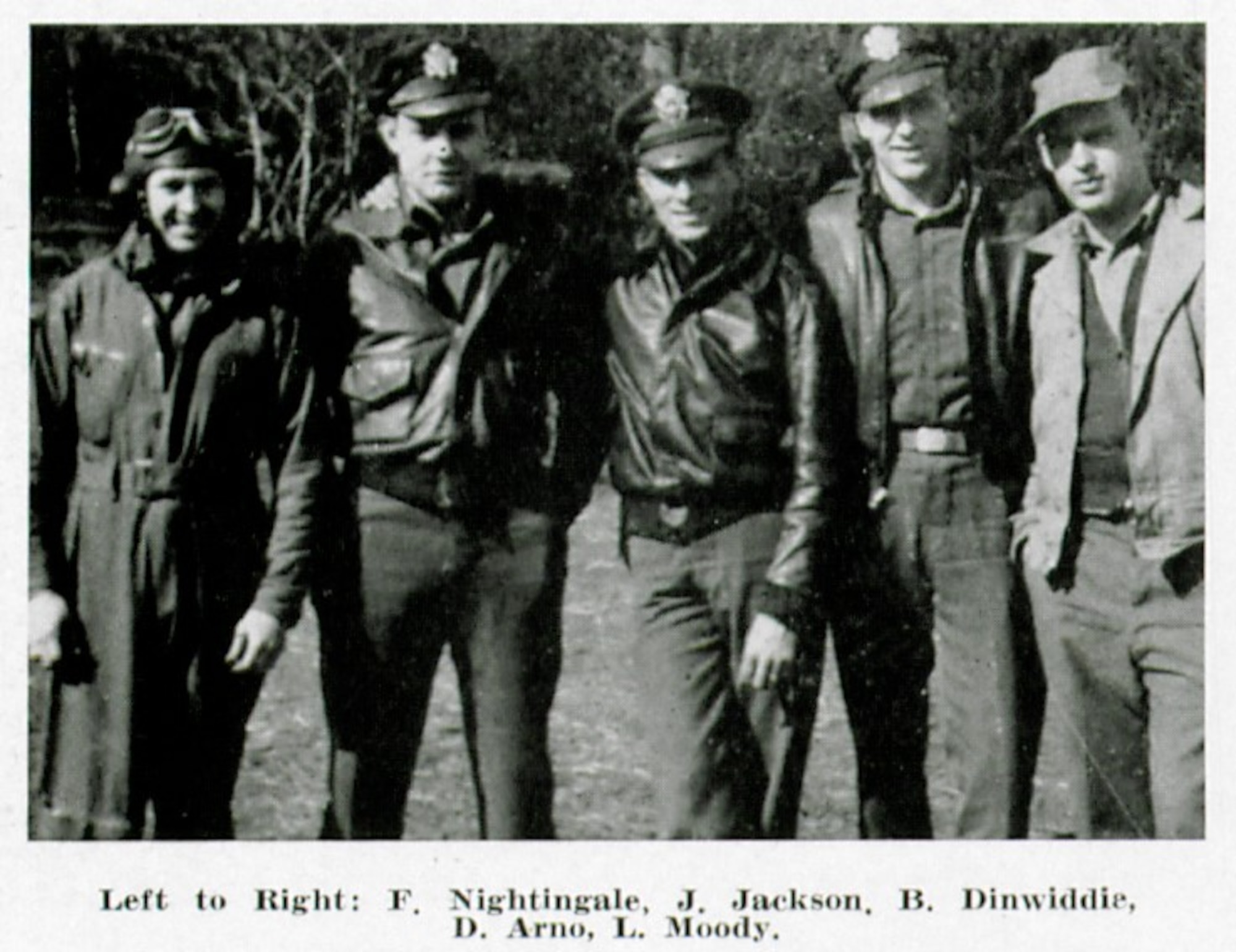 First Lieutenant Fred D. Nightingale, 405th Fighter Squadron, was awarded the Distinguished Flying Cross for a combat mission he flew on 14 October 1944.  He is seen here in flying attire with other pilots of his squadron.  (The Story of the 371st Fighter Group in the ETO)