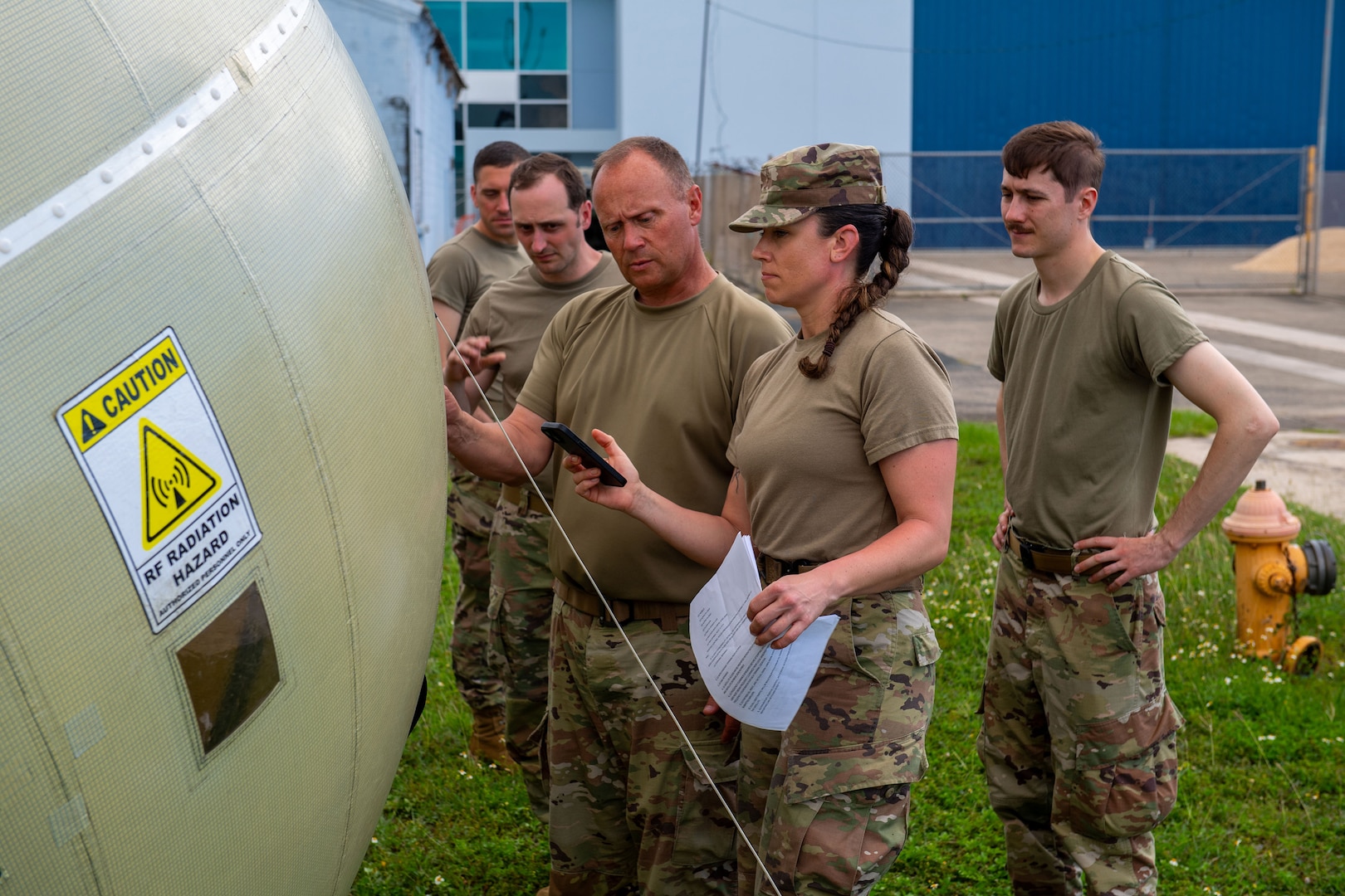 U.S. Airmen assigned to the 265th Combat Communications Squadron collaborate to establish communications via the Ground Antenna Transmit & Recieve (GATR) inflatable antenna April 29th, 2025 in San Juan, Puerto Rico.