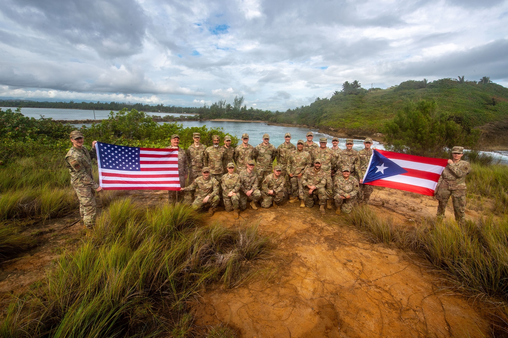U.S. Airmen assigned to the 265th Combat Communications Squadron and the 101st Air Refueling Wing pose for a photo May 1st, 2025 at Punta Selinas Air National Guard Station, Toa Baja, Puerto Rico.