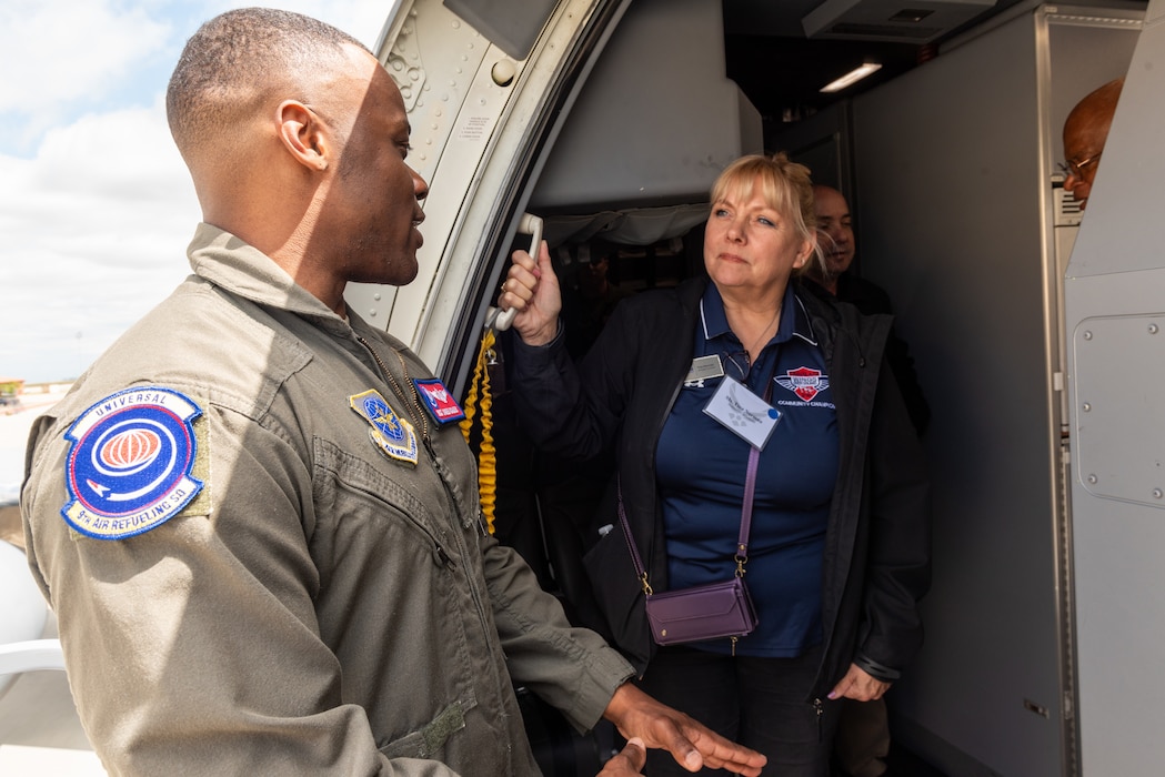 Airman speaks with honorary commander on a KC-46