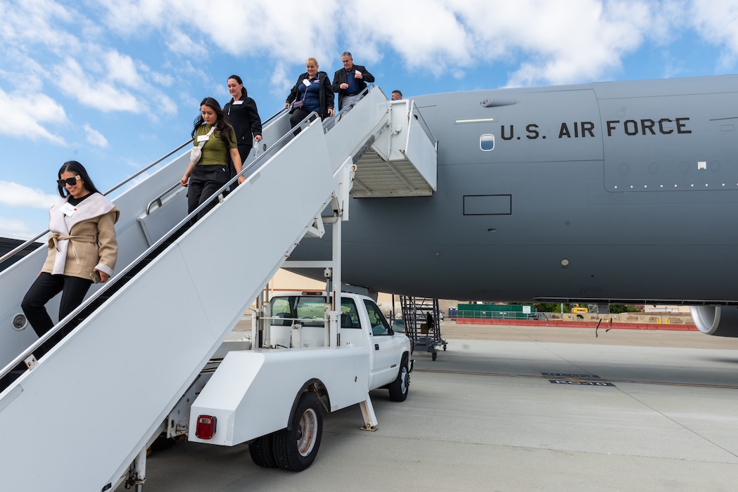 Honorary commanders walk off KC-46