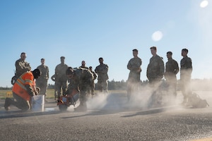 In a continuing effort to refine and enhance Airmen's combat competency and mission readiness the 62d Airlift Wing began implementing its Mission Ready Airmen day program in January 2025, dedicating one day a month to cross-functional training for Airmen across the wing.
