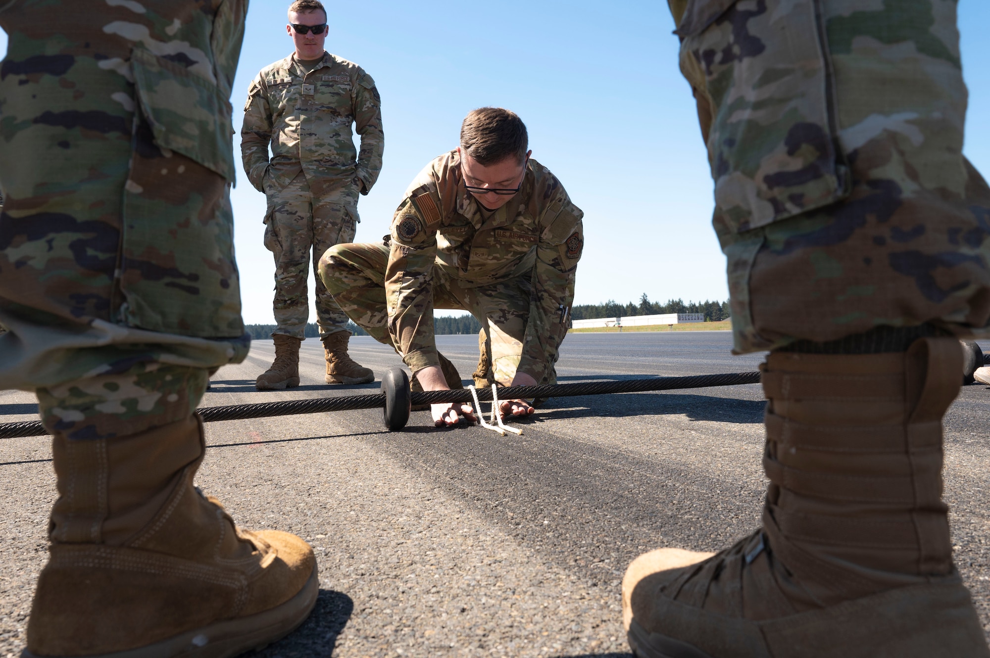 In a continuing effort to refine and enhance Airmen's combat competency and mission readiness the 62d Airlift Wing began implementing its Mission Ready Airmen day program in January 2025, dedicating one day a month to cross-functional training for Airmen across the wing.