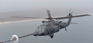 A New York Air National Guard HH-60W Jolly Green II rescue helicopter, assigned to the New York Air National Guard's 106th Rescue Wing, conducts an aerial refueling along the coast of Long Island, N.Y., May 3, 2025.