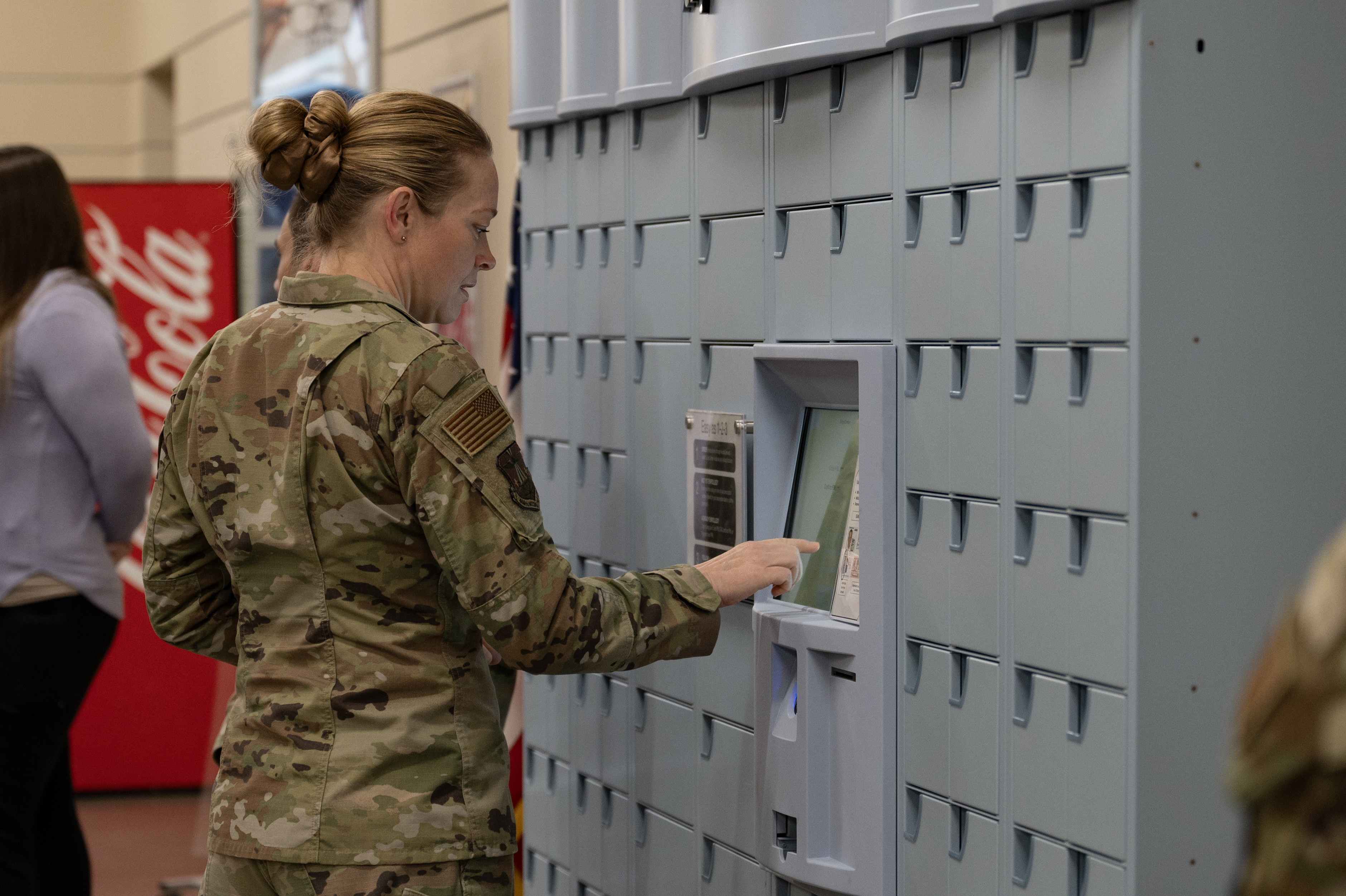 A service member from Buckley Space Force Base creates a ScriptCenter account during a ribbon cutting ceremony on May 6, 2025. The ScriptCenter is a free, no-contact kiosk where prescriptions, once filled by the pharmacy, are securely stored for convenient pickup. (U.S. Space Force photo by Staff Sgt. Danielle McBride)