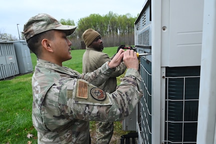 Members of the D.C. Air National Guard’s 113th Wing Civil Engineer Squadron (CES) conduct HVAC diagnostics and repair, LED lighting installation, plumbing fixture placement, and electrical rewiring at the Capital Guardian Youth ChalleNGe Academy (CGYCA), in Laurel, MD, on April 12, 2025. The hands-on April 7-19 project not only offered vital Administrative Building upgrades, but also skills development. Civil engineers maintain the infrastructure for military operations ensuring they’re functional, relevant, efficient, and resilient in various operational environments.