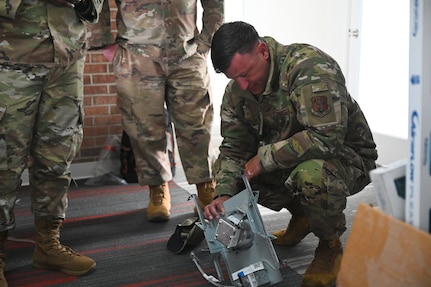 Members of the D.C. Air National Guard’s 113th Wing Civil Engineer Squadron (CES) conduct HVAC diagnostics and repair, LED lighting installation, plumbing fixture placement, and electrical rewiring at the Capital Guardian Youth ChalleNGe Academy (CGYCA), in Laurel, MD, on April 12, 2025. The hands-on April 7-19 project not only offered vital Administrative Building upgrades, but also skills development. Civil engineers maintain the infrastructure for military operations ensuring they’re functional, relevant, efficient, and resilient in various operational environments.