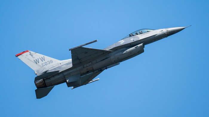 fighter jet flies in the sky