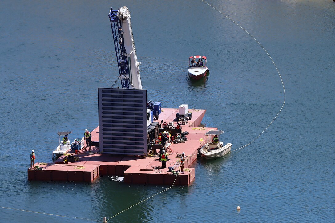 U.S. Army Corps of Engineers Los Angeles District contractors prepare to install an underwater bulkhead gate May 4 at Alamo Dam near Wendon, Arizona.