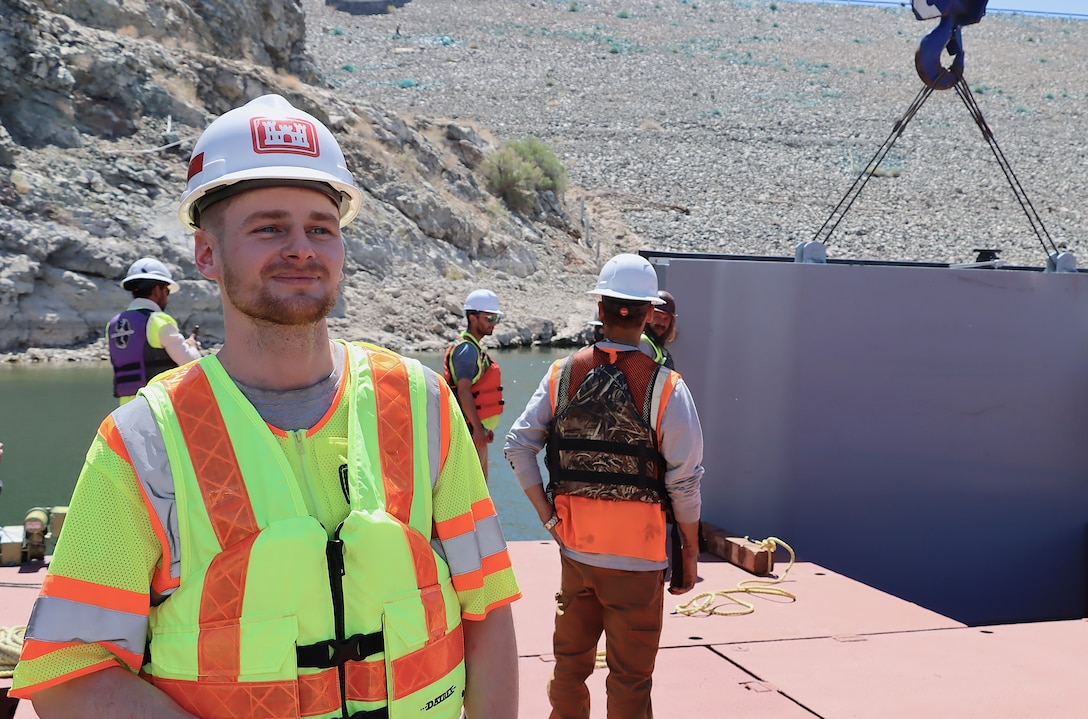 Henry Wassinger, a structural engineer with the Philadelphia District, poses for photo during the May 4 underwater gate installation at Alamo Dam near Wendon, Arizona. The Philadelphia District designed the gate and selected Wassinger to represent their district during the installation.