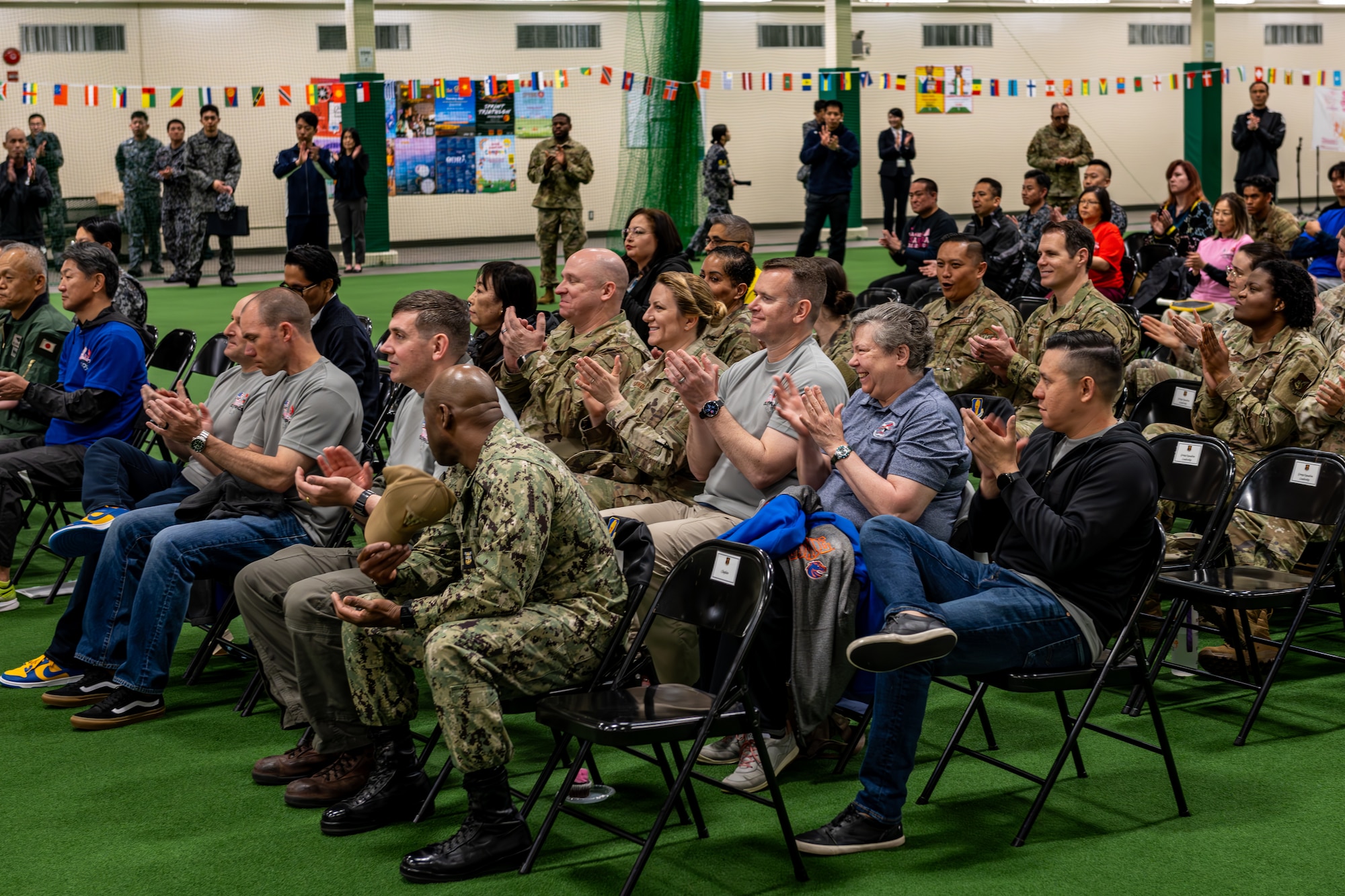 Audience claps after speech.