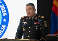 Mongolian Armed Forces Brigadier General Baljid Baatar, deputy chief of the general staff, delivers opening remarks during the Pacific Airlift Rally 25 opening ceremony in Ulaanbaatar, Mongolia, May 5, 2025.