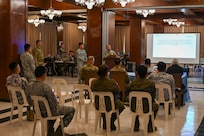 Armed Forces of the Philippines and U.S. service members conduct a post assessment debrief during a Cyber Defense Exercise in support of Exercise Balikatan 25 at Camp Aguinaldo, Manila, Philippines, April 24, 2025.