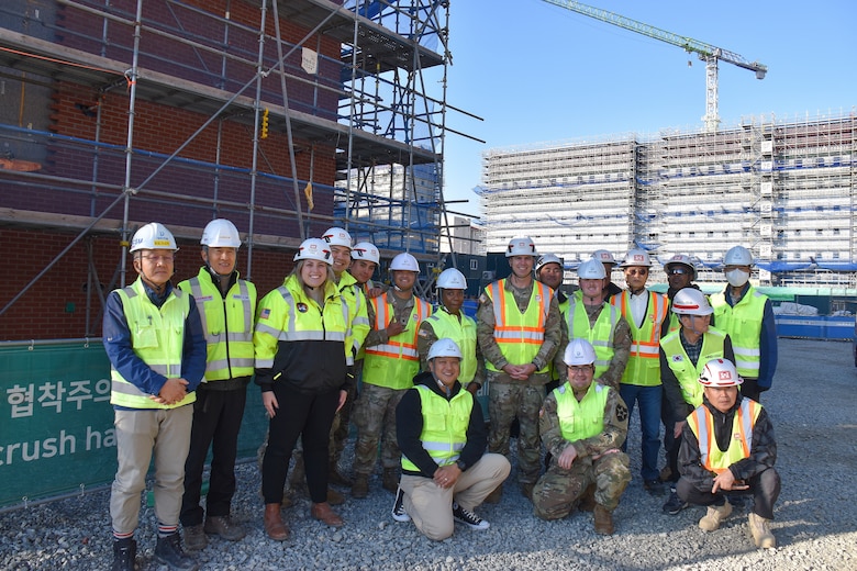 Soldiers from the U.S. Army Garrison Humphreys Better Opportunities for Single Soldiers (BOSS) program and FED employees at a project site.