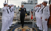 CHANGI NAVAL BASE, SINGAPORE (May 6, 2025) Adm. Steve Koehler, commander, U.S. Pacific Fleet, walks aboard the Arleigh Burke-class guided-missile destroyer USS Dewey (DDG 105) for a tour on Changi Naval Base during the International Maritime Defense Exhibition (IMDEX) Asia 25, May 6, 2025. IMDEX Asia 25 is Asia's leading naval and maritime defense event. The U.S. Navy routinely participates in IMDEX to promote dialogue, stability, and security cooperation throughout the Indo-Pacific. (U.S. Navy photo by Mass Communication Specialist 1st Class Devin Monroe)