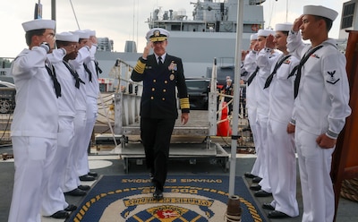 CHANGI NAVAL BASE, SINGAPORE (May 6, 2025) Adm. Steve Koehler, commander, U.S. Pacific Fleet, walks aboard the Arleigh Burke-class guided-missile destroyer USS Dewey (DDG 105) for a tour on Changi Naval Base during the International Maritime Defense Exhibition (IMDEX) Asia 25, May 6, 2025. IMDEX Asia 25 is Asia's leading naval and maritime defense event. The U.S. Navy routinely participates in IMDEX to promote dialogue, stability, and security cooperation throughout the Indo-Pacific. (U.S. Navy photo by Mass Communication Specialist 1st Class Devin Monroe)