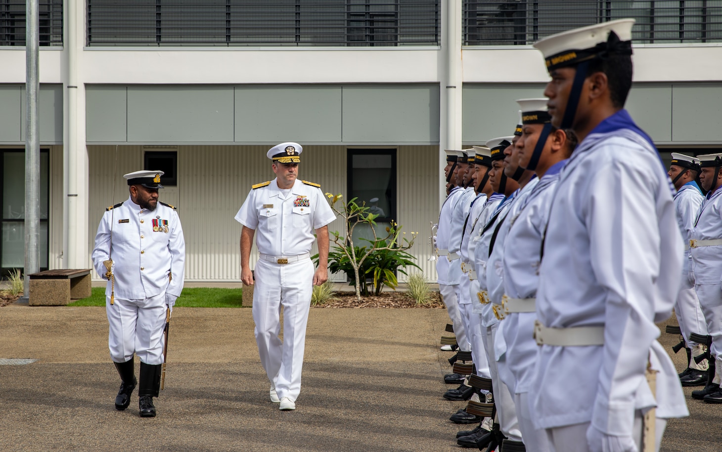 SUVA, Fiji (May 8, 2025) Rear Adm. Kyle Gantt, center, deputy commander, U.S. 7th Fleet, participates in an inspection ceremony with sailors of the Republic of Fiji Navy, prior to staff talks during a port visit to Suva, Fiji, May 8, 2025. The U.S. 7th Fleet flagship USS Blue Ridge (LCC 19), and the 7th Fleet staff conduct regular Indo-Pacific patrols to deter aggression, strengthen alliances and partnerships, and advance future warfighting capabilities. (U.S. Navy photo by Mass Communication Specialist 1st Class Ryan M. Breeden)