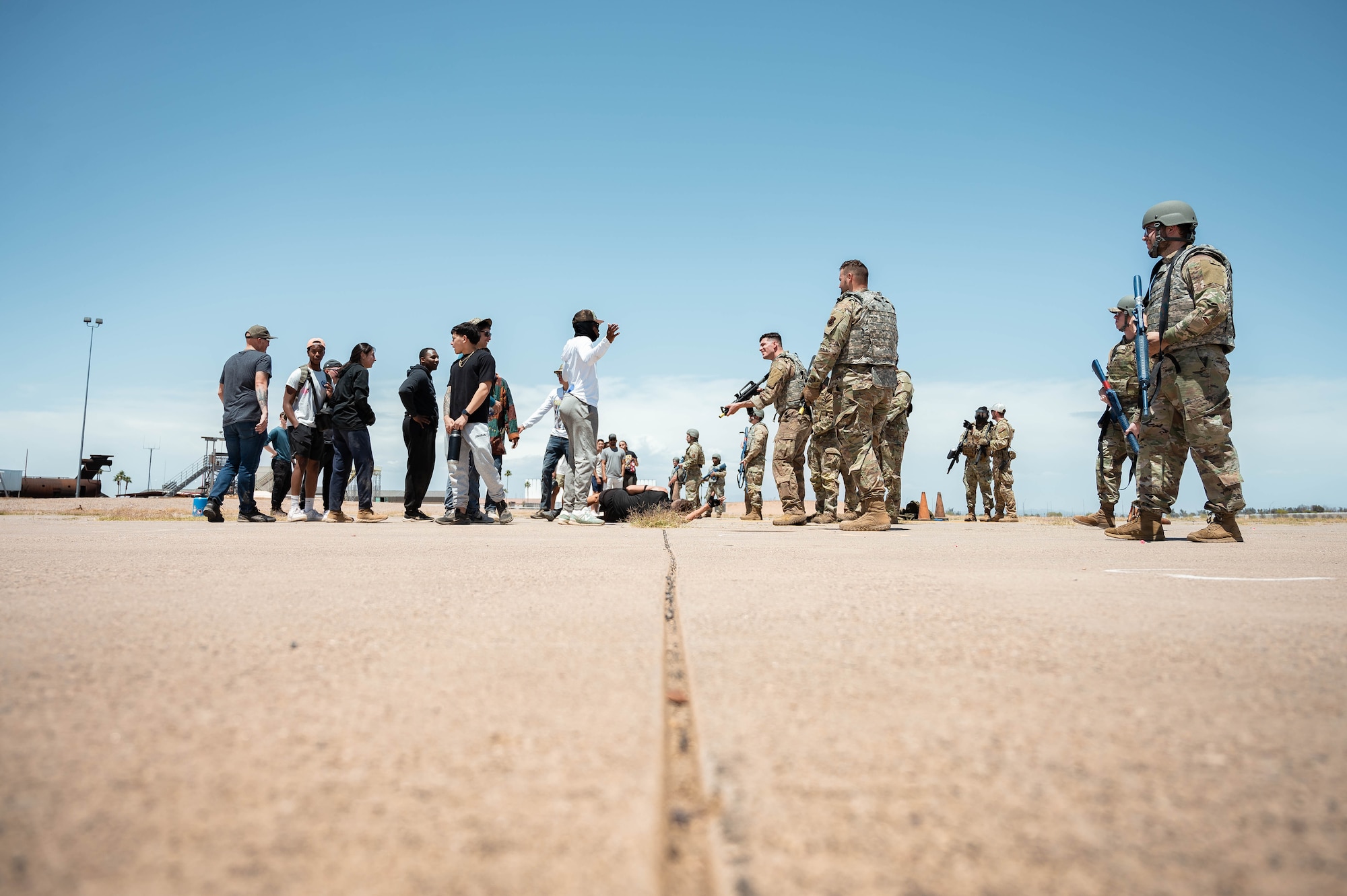 U.S. Air Force airmen assigned to the 56th Fighter Squadron role-play as antagonistic threats against Airman Leadership School students