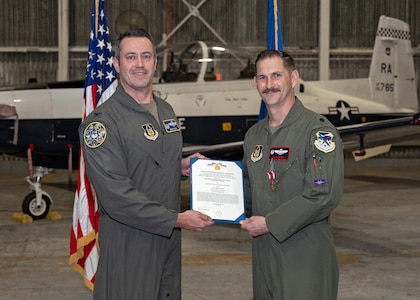 Former 487th TRS commander receives Meritorious Service Medal
