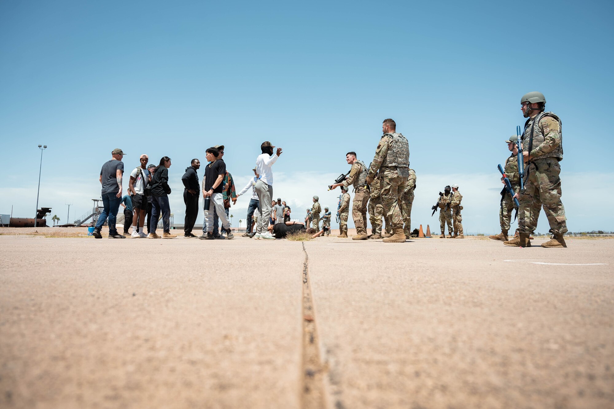 U.S. Air Force airmen assigned to the 56th Fighter Squadron role-play as antagonistic threats against Airman Leadership School students