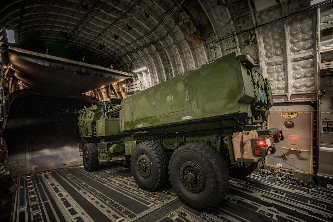 A U.S. Marine Corps High Mobility Artillery Rocket System disembarks from a U.S. Air Force C-17 Globemaster during a HIMARS Rapid Infiltration training on Naval Air Facility Atsugi, Kanagawa, Japan, March 17, 2025. The training demonstrates 3d Battalion, 12th Marine Regiment’s ability to rapidly deploy long-range fire throughout the Indo-Pacific. A HIRAIN is the process of identifying a target, seizing key terrain, inserting HIMARS, destroying the target and retrograding back to a secure location. (U.S. Marine Corps photo by Lance Cpl. Matthew Morales)
