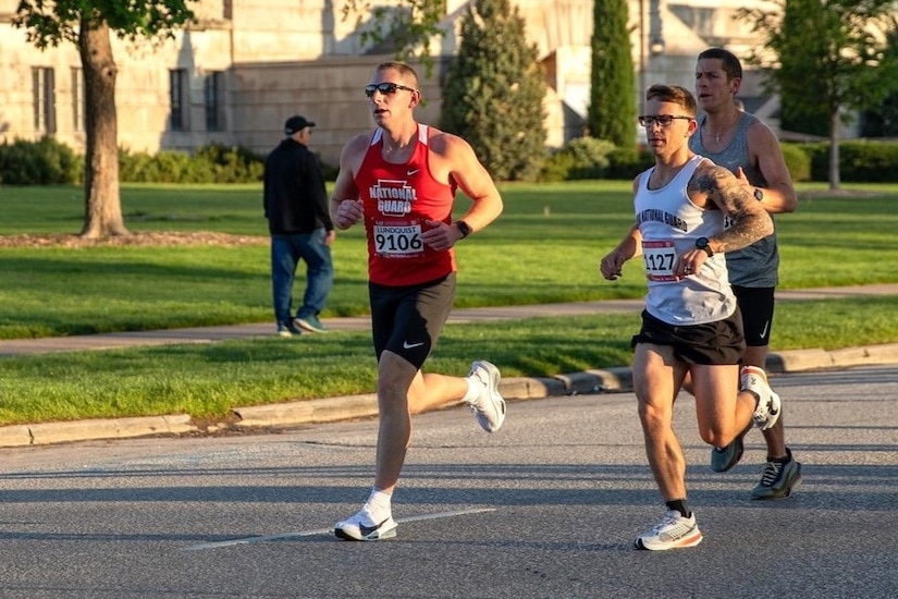 Sgt. 1st Class Tyler Lundquist (red shirt) of the Pennsylvania Army National Guard Recruiting and Retention Battalion competes in the National Guard Marathon Team trials May 4, 2025, at the Lincoln Marathon in Lincoln, Nebraska. Lundquist was the fifth National Guard male finisher with a time of 2:44:04 and earned a spot on the All-Guard Marathon Team for the third time. (Courtesy photo)