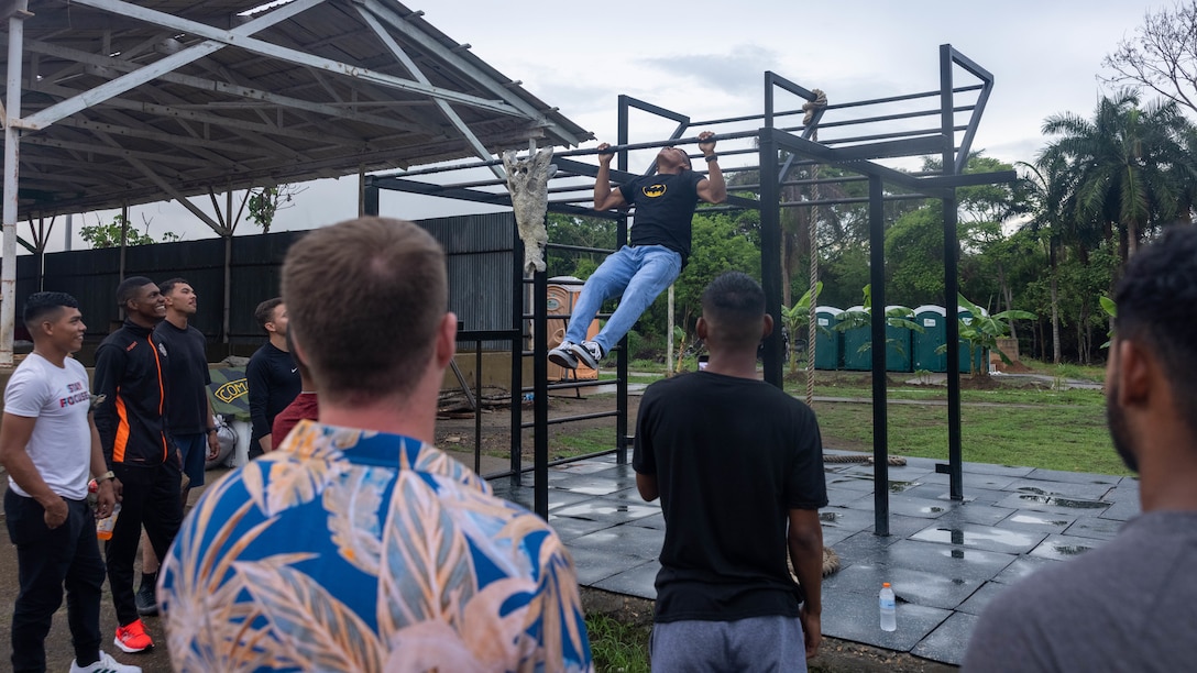 U.S. Marines with 1st Battalion, 8th Marines, 6th Regiment, 2d Marine Division and Panamanian security forces challenge each other to a pull up competition  in Rodman, Panama, May 2, 2025. U.S. Southern Command is focused on increasing partner nation capacity and interoperability in the region and reflects the United States’ enduring promise of friendship, partnership, and solidarity with the Panamanian people. (U.S. Marine Corps photo by Lance Cpl. Francis Hrosar)