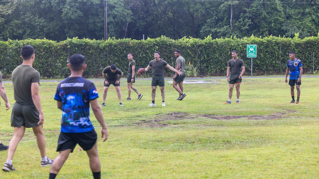 U.S. Marines with 1st Battalion, 8th Marines, 6th Regiment, 2d Marine Division play football with Panamanian security forces in Rodman, Panama, May 2, 2025. U.S. Southern Command is focused on increasing partner nation capacity and interoperability in the region and reflects the United States’ enduring promise of friendship, partnership, and solidarity with the Panamanian people. (U.S. Marine Corps photo by Lance Cpl. Francis Hrosar)