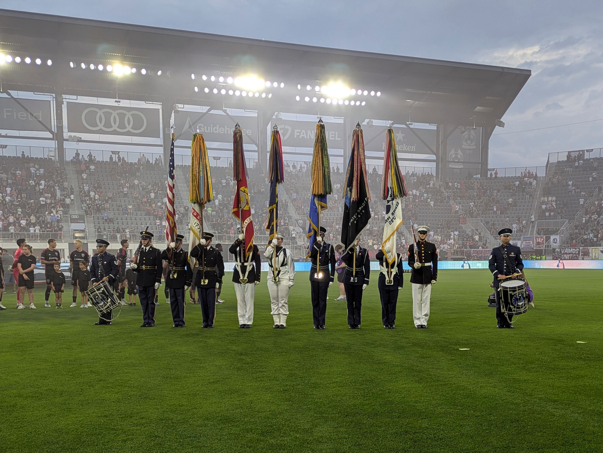 Members of the Military District of Washington Joint Armed Forces Color Guard present the colors during the national anthem prior to a DC United Football Club match at Audi Field in Washington D.C., May 3, 2025. DC United invited the Joint Armed Forces Color Guard to participate in their Military Appreciation Night and honored veterans in attendance. (U.S. Air Force photo by Staff Sgt. Brandon Schneider)