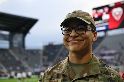U.S. Air Force Airman 1st Class Nery Rivera, a relocations technician assigned to the 11th Force Support Squadron, prepares to participate in the DC United Football Club opening ceremony at Audi Field in Washington D.C., May 3, 2025. Rivera was the DC United standard bearer and planted the club's flag on the field before the match. (U.S. Air Force photo by Staff Sgt. Brandon Schneider)