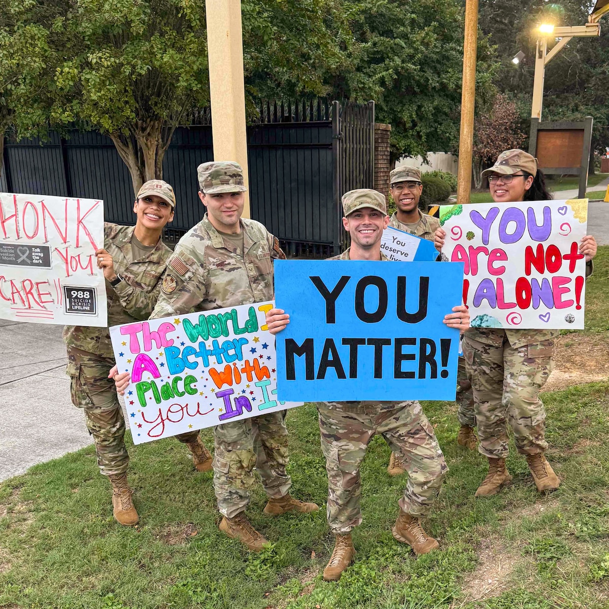 Image of a group of Airmen posing for a photo.