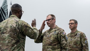 U.S. Space Force Lt. Col. Kyle Keith, Combat Detachment 3-1 incoming commander, renders his first salute to Col. Frank Brooks, U.S. Space Force Central deputy commander, within the U.S. Central Command area of responsibility, May 8, 2025. Combat Detachment 3-1 delivers critical command and control for SPACECENT teams across the region, enabling vital space-based capabilities. (U.S. Air Force photo by Senior Airman Dieondiere Jefferies)