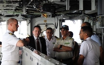 U.S. and Mauritanian military and civilian officials pose for a photo aboard the Blue Ridge-class command and control ship USS Mount Whitney (LCC 20) during a leadership engagement while anchored near Nouakchott, Mauritania, May 8, 2025.