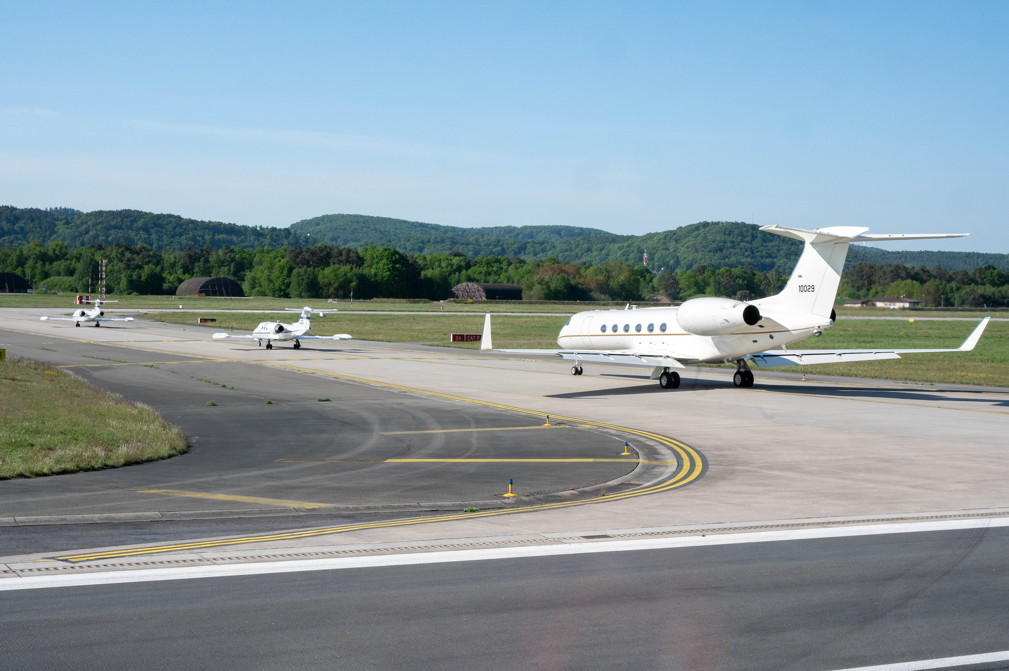 Two C-21A Learjet and a C-37A Gulfstream aircraft participate in an elephant walk