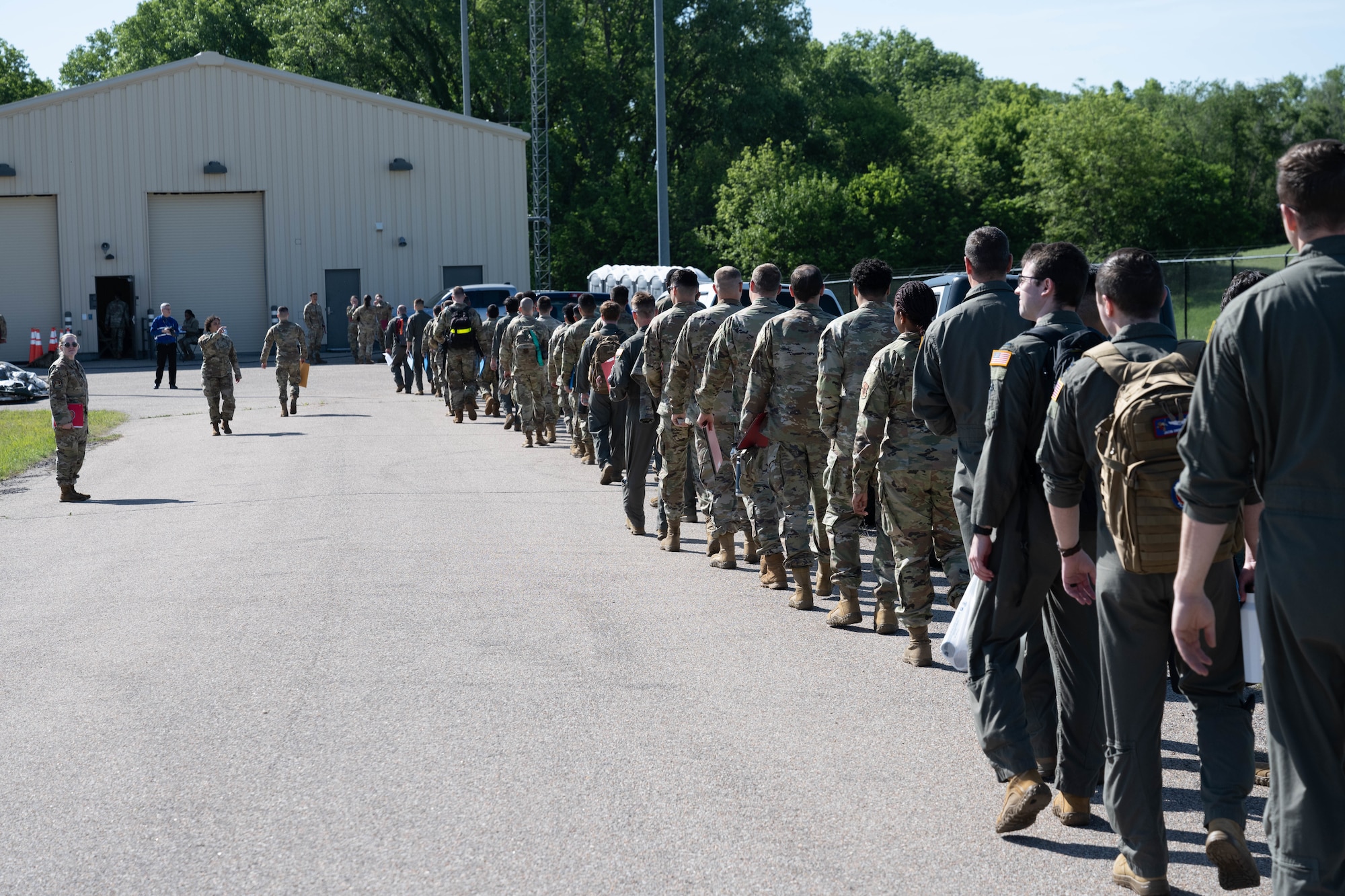 Team McConnell Airmen await an Exercise Lethal Stack in-processing brief at McConnell Air Force Base, Kansas, May 5, 2025. Lethal Stack exercises the ability to survive and operate in a contested, degraded and operationally limited environment. (U.S. Air Force photo by Airman 1st Class Patrick O’Neill)