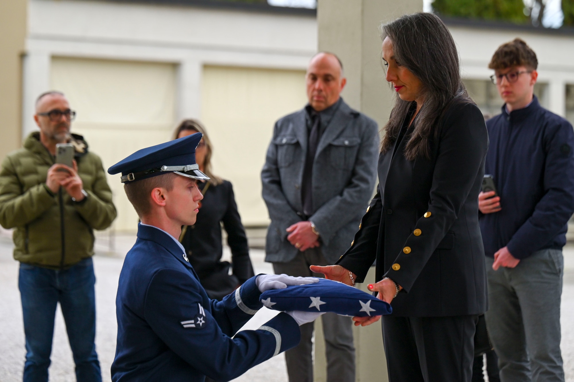 Honor Guardsman presenting flag