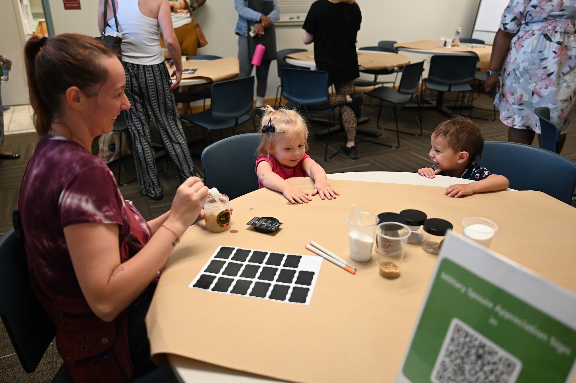 Military spouses gather to make sugar scrubs during Military Spouse Appreciation Day at Holloman Air Force Base, New Mexico, May 8, 2025. Holloman AFB celebrated Military Spouse Appreciation Day with events featuring spa treatments, DIY crafts, and free food. (U.S. Air Force photo by Senior Airman Michelle Ferrari)