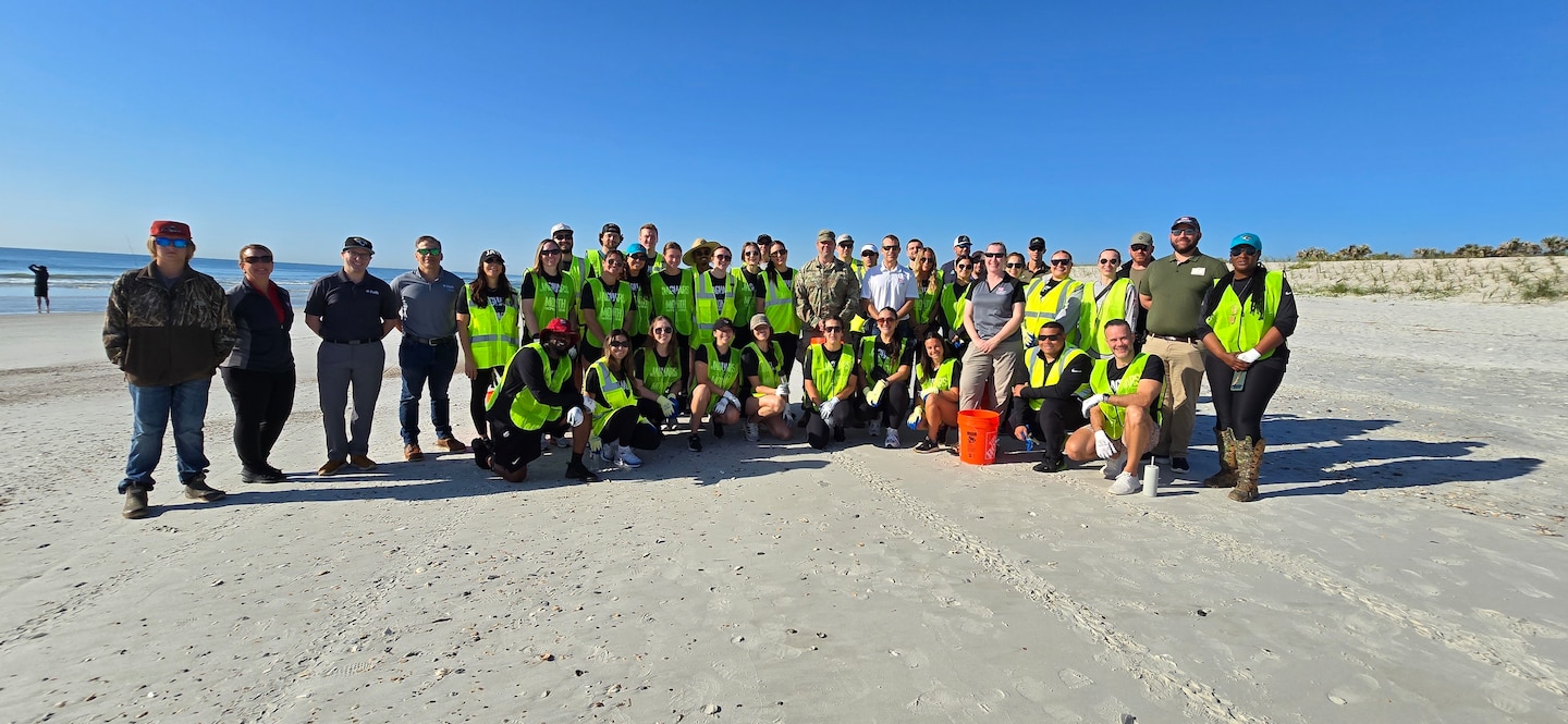 The USACE Jacksonville District and volunteers from the Jacksonville Jaguars take on invasive species and plant dune vegetation near Hanna Park, as part of the Duval County Shore Protection Project.