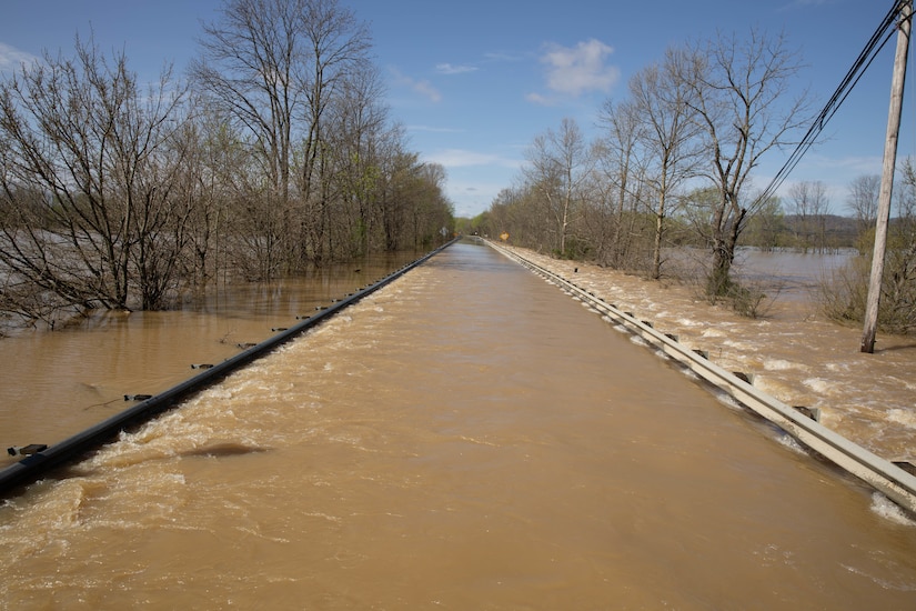 Flood waters cover U.S. 62 (Boston Rd.) leading into Boston, Ky., Apr. 7, 2025. Soldiers with Charlie Battery, 2nd Battalion, 138th Field Artillery Brigade based in Bardstown, work with local officials to aid Nelson Countians stranded because of flood waters. The catastrophic flooding is the result of several days of heavy rainfall across the commonwealth. (U.S. Army National Guard Photo by Milt Spalding)