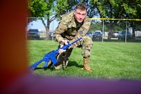 U.S Space Force Spc. 3 Kadrien Smith, Space Force Honor Guardsman, navigates a weapons course  during a tactical weapons training exercise on Joint Base Anacostia-Bolling, Washington, D.C, April 19, 2025. The event was a part of the First Term Enlisted Course which emphasized the importance of developing mission-ready Airmen, through discipline, adaptability and sharpening combat skills for future operational demands. (U.S. Air Force photo by Airman 1st Class Shanel Toussaint)