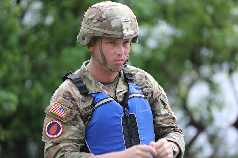 Sgt. Miles Crawford of the Maryland National Guard's 58th Military Intelligence Brigade prepares to compete in the kayaking event during the Region II Best Warrior Competition in Harrisburg, Pennsylvania, May 6, 2025. (U.S. Army National Guard photo by Spc. Annie M. Riley)