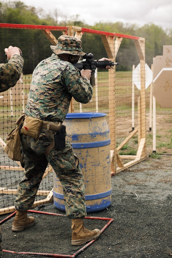 U.S. Marine Corps 1st Sgt. Justin Cuomo, the first sergeant of Charlie Company, 1st Battalion, 23rd Marine Regiment, 4th Marine Division, shoots an M16 rifle as a part of the multi-weapon match during the Marine Corps Championships hosted by Weapons Training Battalion, on Marine Corps Base Quantico, Virginia, April 12, 2025. This competition brings together top shooters from regional marksmanship events to test their skills in precision rifle, action rifle, action pistol, and multi-gun action shooting. It continues the legacy of the Marine Corps Shooting Team, which has upheld marksmanship excellence since the early 1900s and reinforces the Corps' commitment to marksmanship as a core warfighting skill. (U.S. Marine Corps photo by Cpl. Joshua Barker)