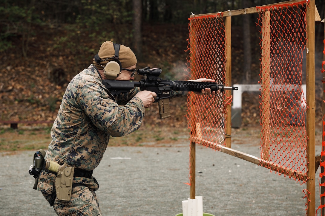 U.S. Marine Corps Maj. Zachary Weidner, company commander of Motor Transportation Instruction Company, Training Command, shoots an M16 rifle as a part of the multi-weapon match during the Marine Corps Championships hosted by Weapons Training Battalion, on Marine Corps Base Quantico, Virginia, April 12, 2025. This competition brings together top shooters from regional marksmanship events to test their skills in precision rifle, action rifle, action pistol, and multi-gun action shooting. It continues the legacy of the Marine Corps Shooting Team, which has upheld marksmanship excellence since the early 1900s and reinforces the Corps' commitment to marksmanship as a core warfighting skill. (U.S. Marine Corps photo by Cpl. Joshua Barker)