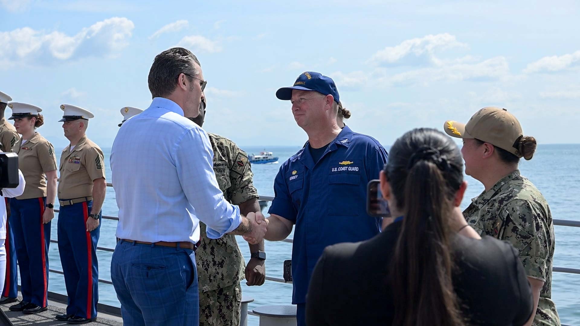 Captain Robert Kinsey, Commanding Officer of U.S. Coast Guard Cutter Kimball (WMSL 756) receives U.S. Secretary of Defense, Pete Hegseth, aboard the USS Chosin (CG-65) April 9, 2025, in Panama City, Panama. USCGC Kimball is currently deployed for a 83-day counter narcotics patrol in the Eastern Pacific Ocean. (U.S. Coast Guard photo by Petty Officer 3rd Class Austin Wiley)